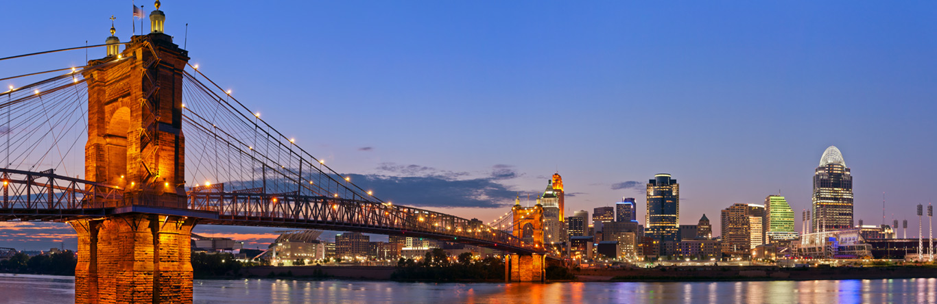 bridge leading downtown at dusk